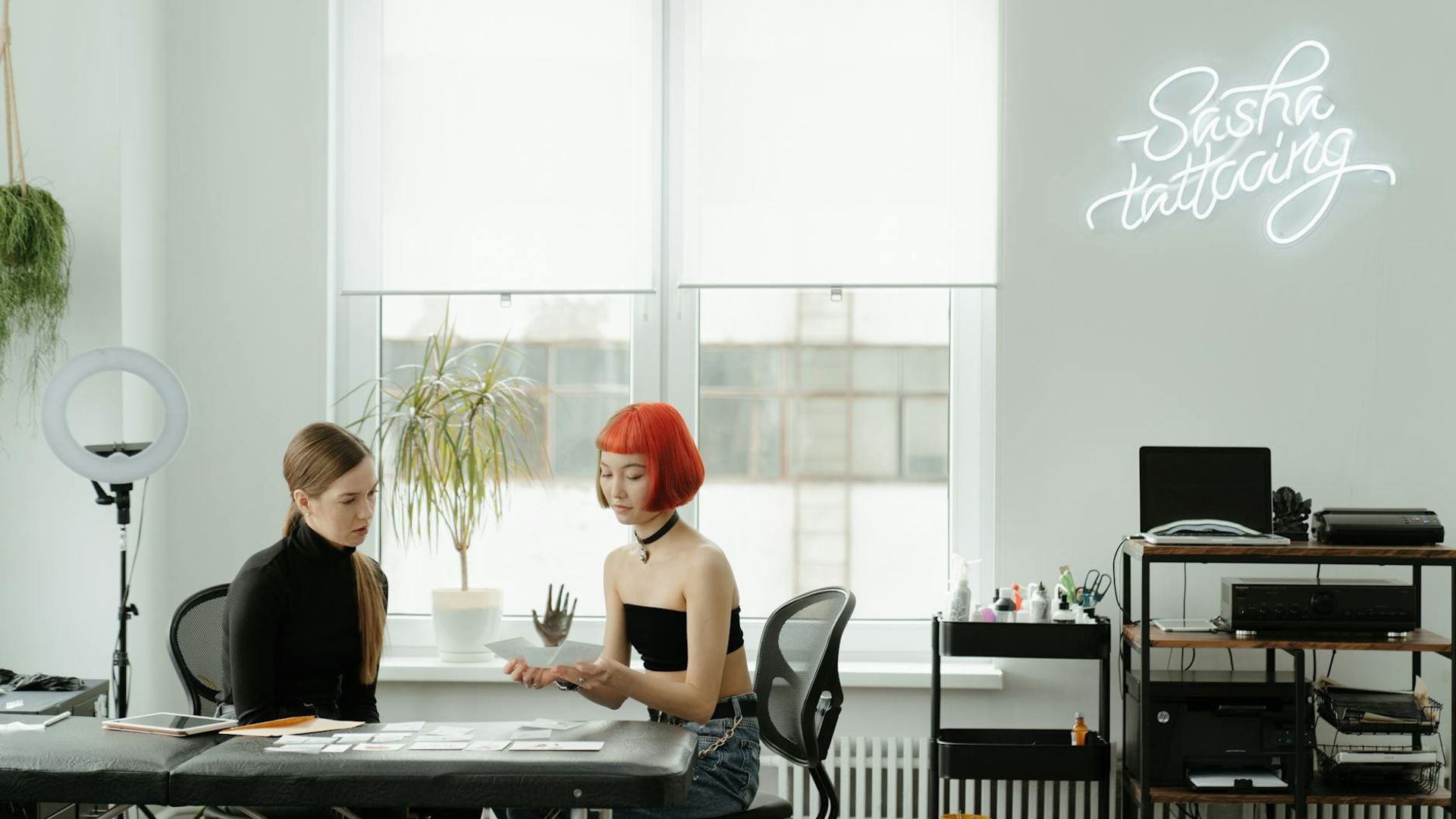 Atmospheric training space with neon lighting and modern equipment.