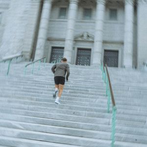 Dynamic blur effect of someone performing cardio steps.